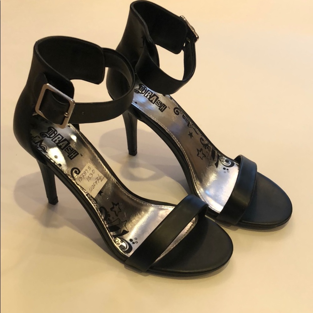 Pretty black ankle strap heels.